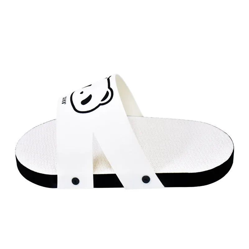 White corrugated paper cat scratch board in a slipper style design on a plain background.