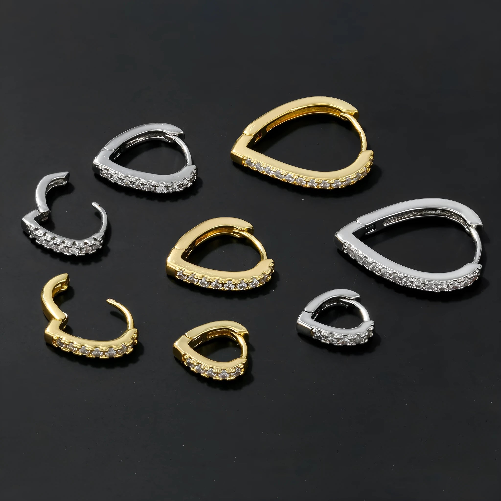 Geometric heart-shaped copper ear clip with electroplated gold finish and clip-on fitting