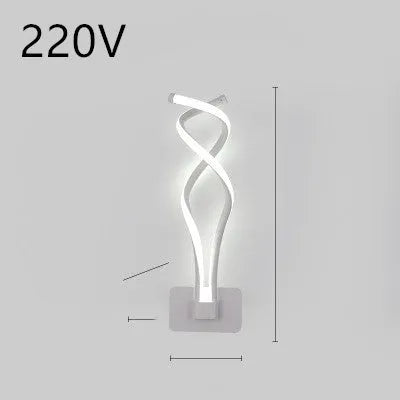 Minimalist Nordic design LED wall lamp with a silicone shade, mounted on a bedroom wall.