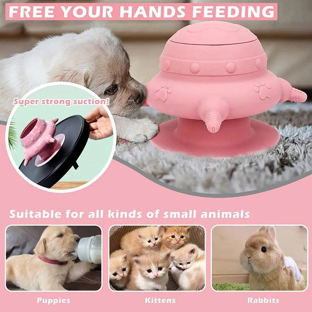 Pink silicone pet nursing bottle with bionic breast shape and four attached nipples on a flat base.