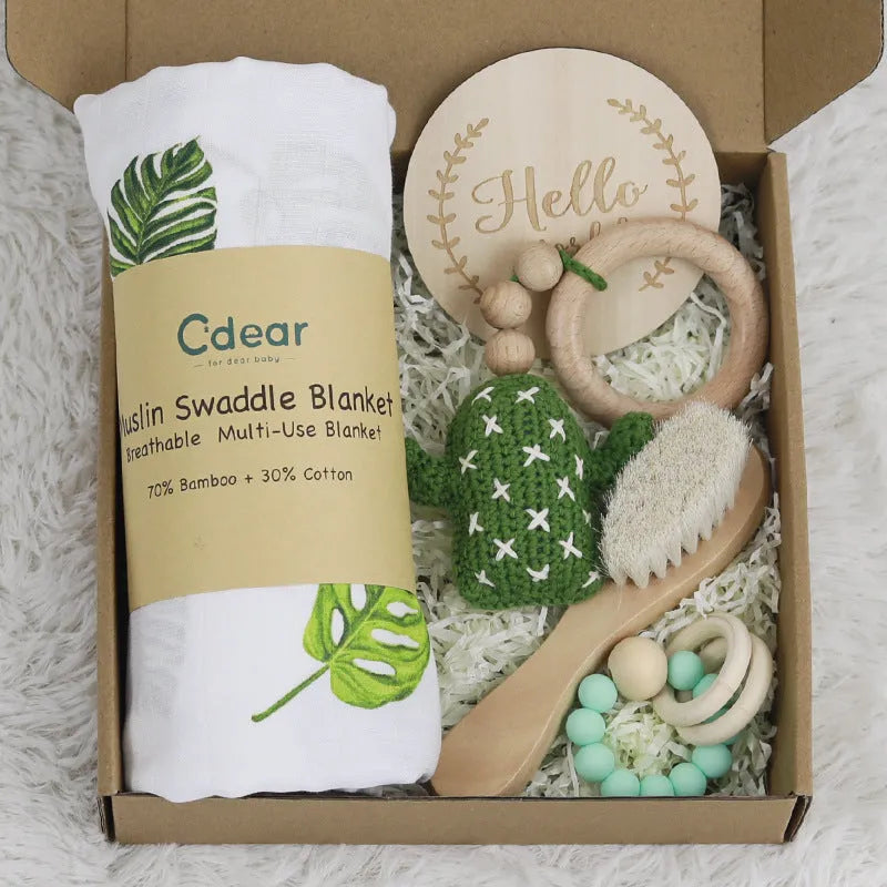 Baby teething toy gift set with bamboo cotton blanket and natural beech wood components