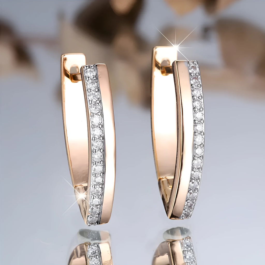 Women's V-shaped electroplated copper ear clips in Champagne Gold and White Diamond geometric design