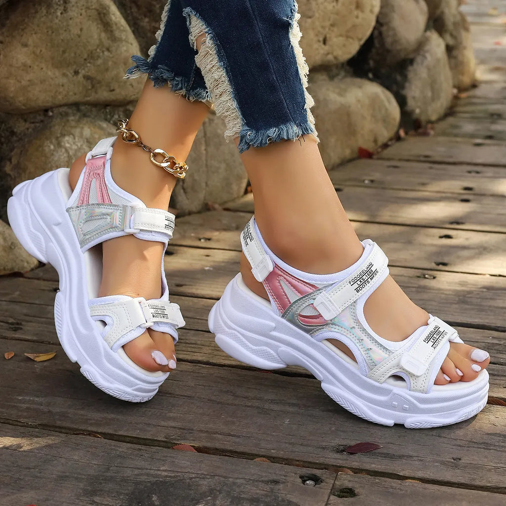 Women's white Roman platform sports sandals with strapped PU upper on a rubber sole.