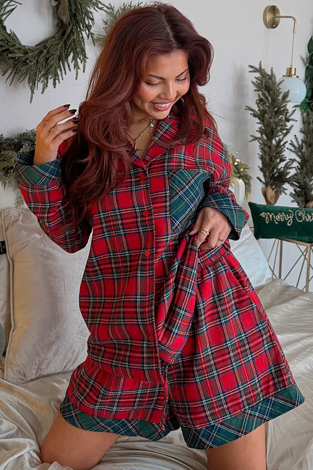 Red plaid Christmas pyjama set with long sleeve shirt and shorts featuring contrast patch details