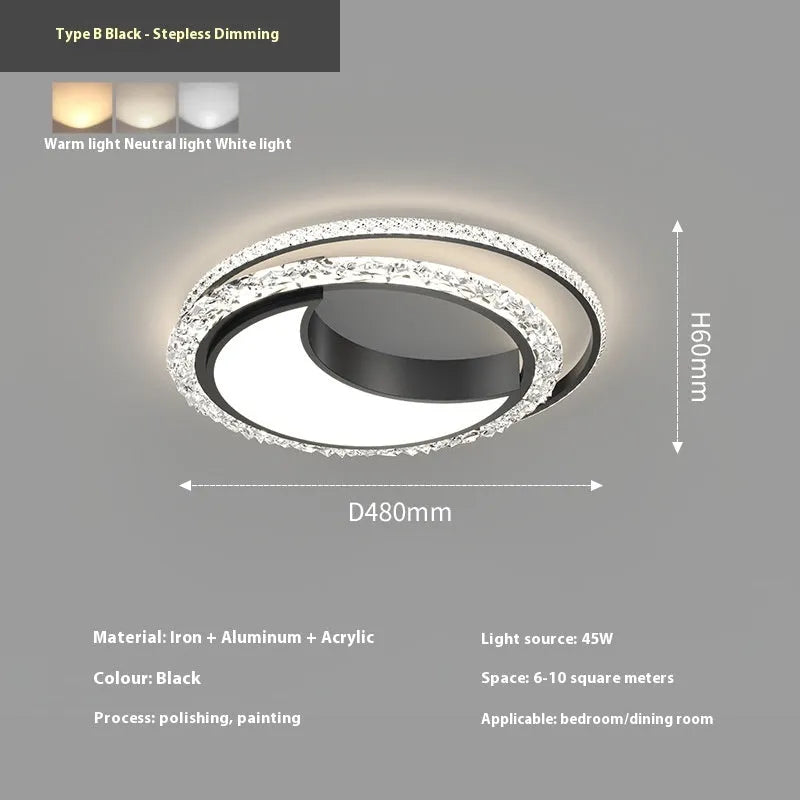 Modern round iron ceiling lamp in black finish mounted on a white ceiling.
