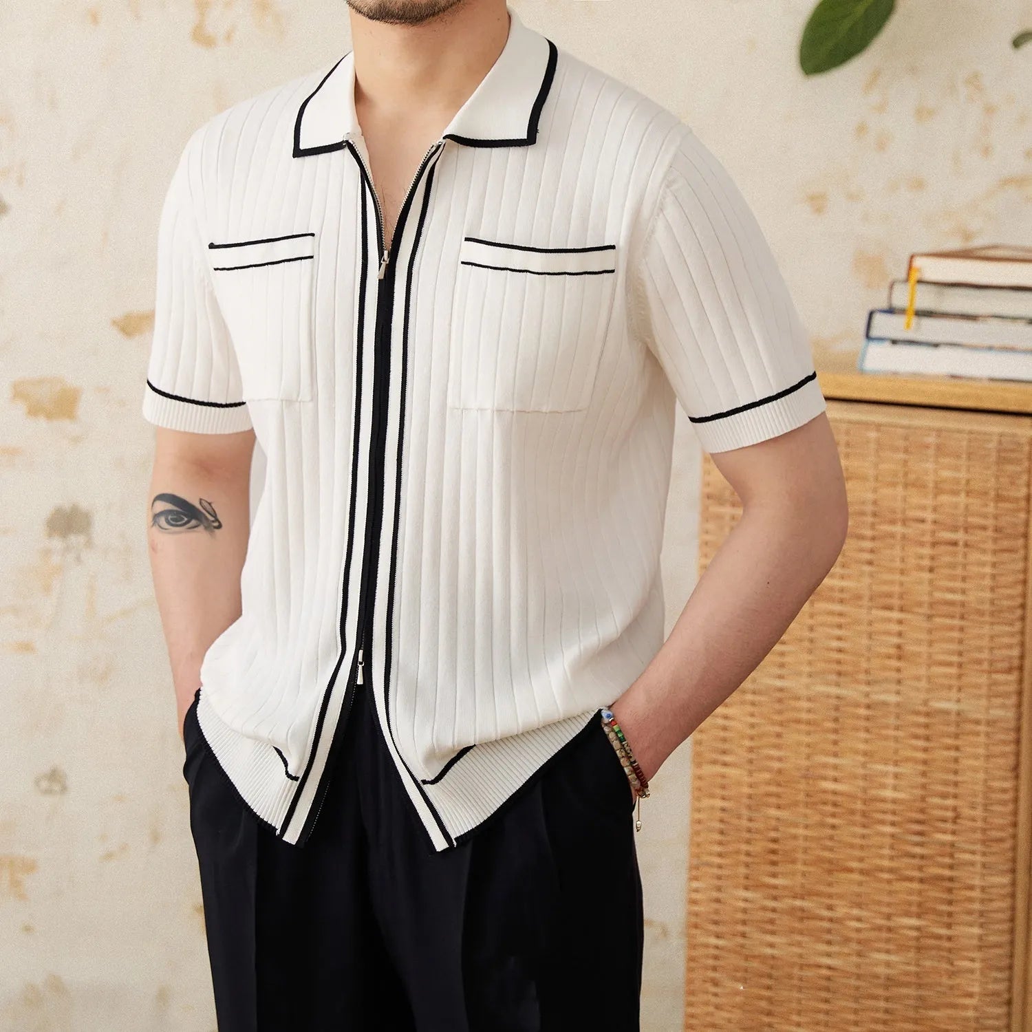 Slim elastic lapel polo shirt in black and white colour options showing front and detail views