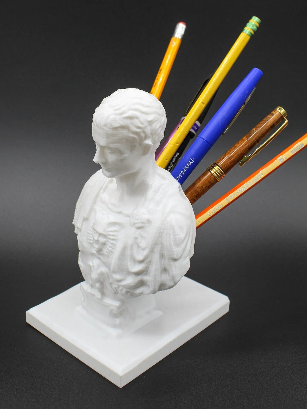 White American creative character modelling pen holder made from synthetic resin for desktop organisation