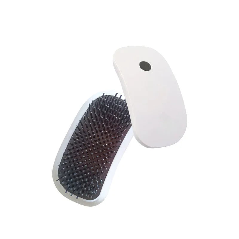 Pink electric pet massage brush with TPE teeth for cats and dogs
