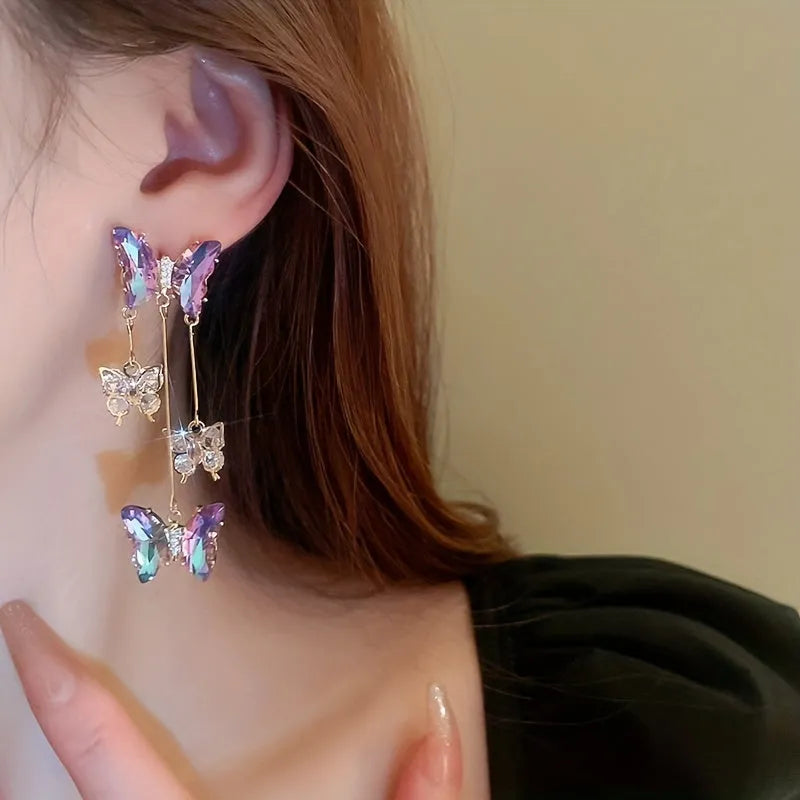 Silver needle crystal flowers butterfly tassel earrings with blue purple motifs and electroplated alloy construction
