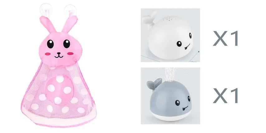 White and blue whale-shaped bath toy spraying water with LED lights on, floating in a baby bath