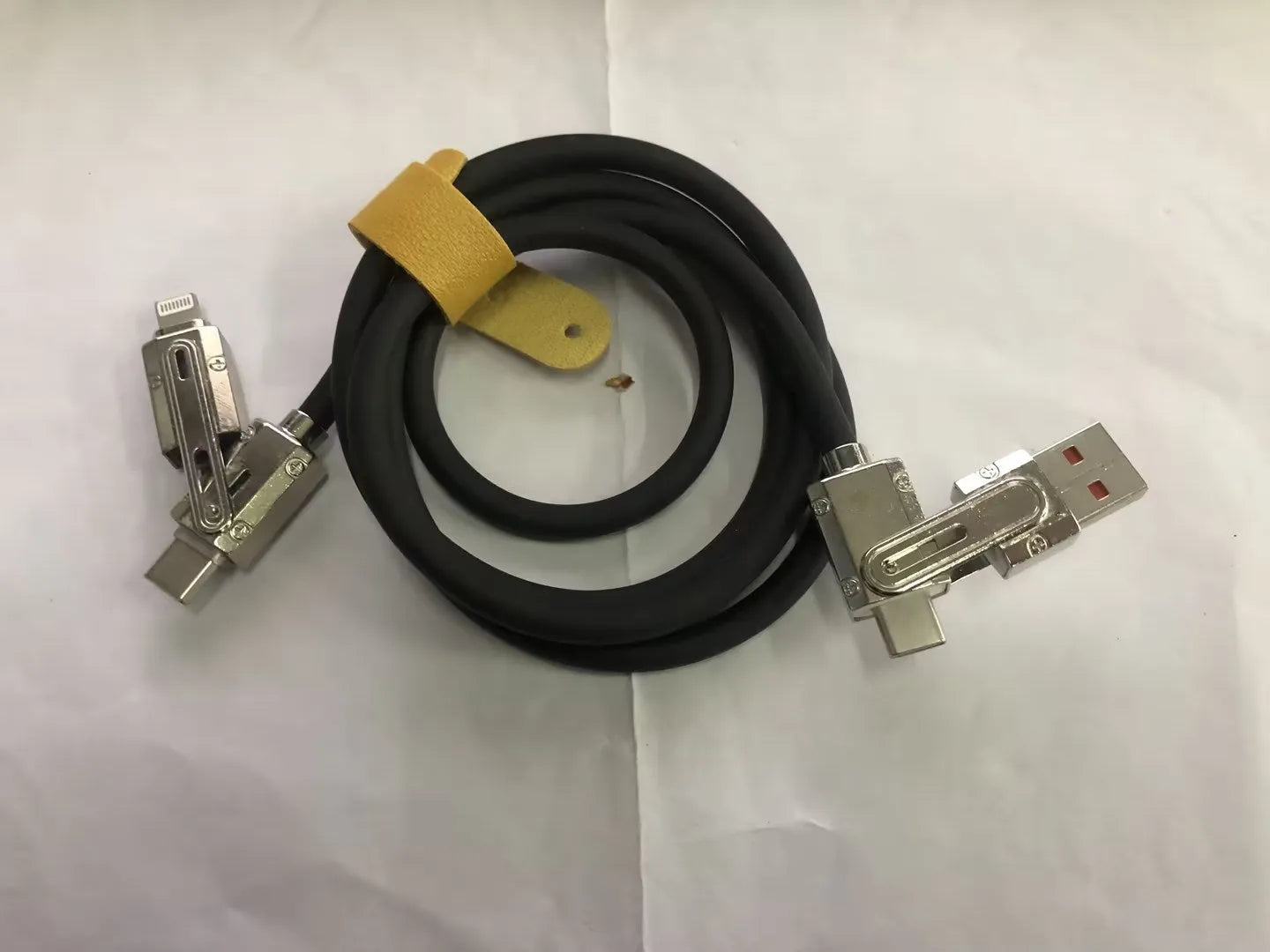 Orange fast-charging cable with Lightning and Type-C connectors, 1 metre long with zinc alloy ends.
