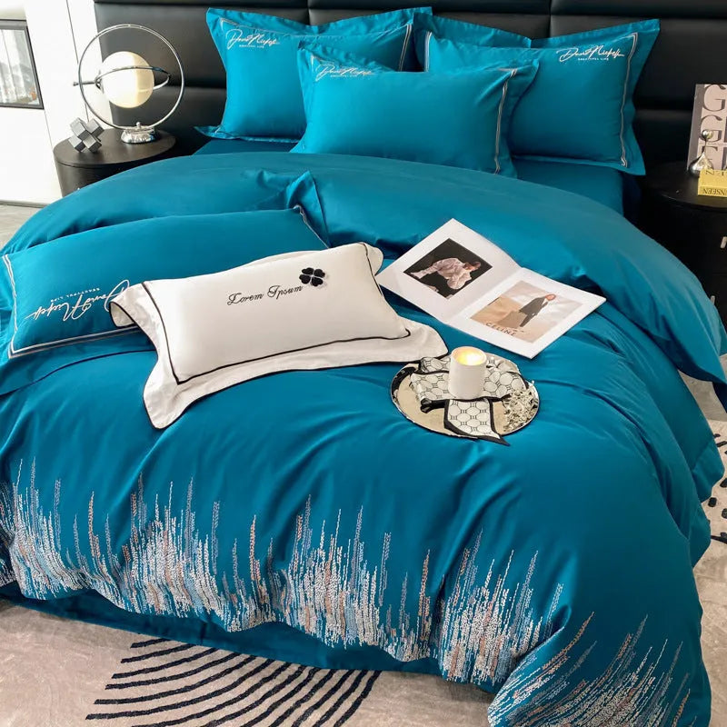 Pure cotton four-piece bedding set with embroidered details, available in dove gray, ruifen, or xingyao blue, for 1.5m or 1.8m bed