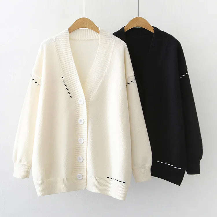 Women's loose fit black knitted cardigan with long sleeves