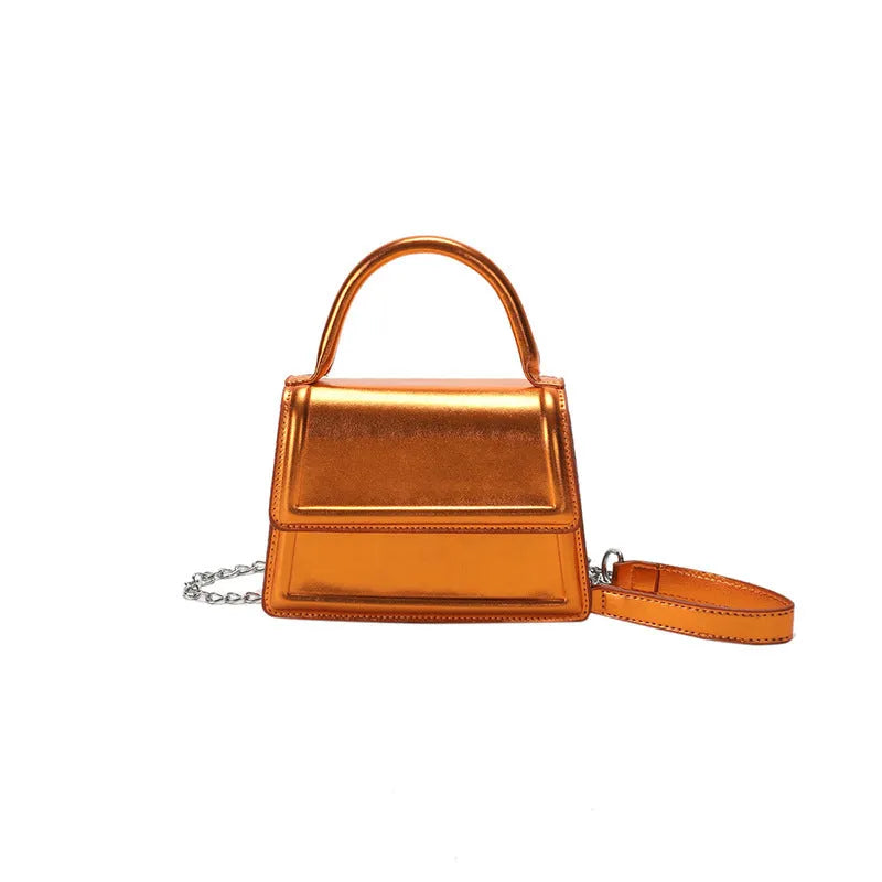 Retro square crossbody bag in PU leather with sewing line details, shown in a selection of colours.