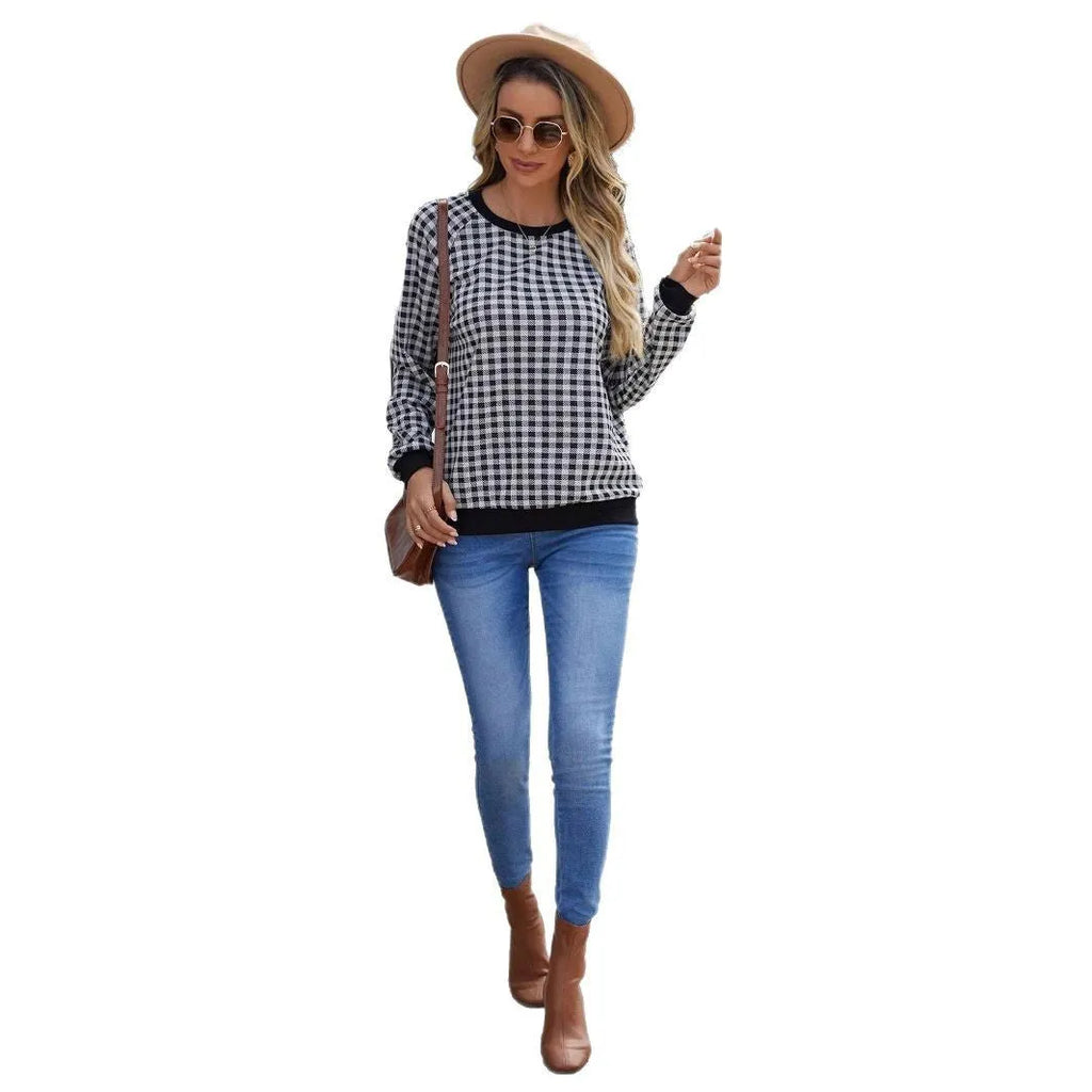 Black long sleeve pullover sweater with plaid and striped printed pattern