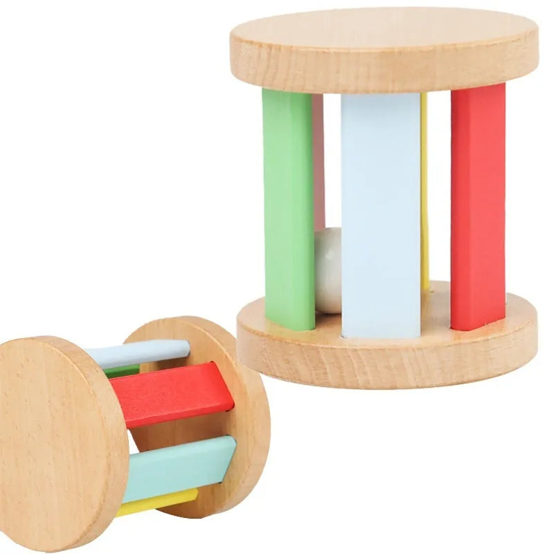 Wooden infant rainbow rattle with rainbow rolling bell, 7.5x7 cm size, on a white background