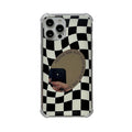 Mirror phone case with chessboard plaid pattern against black background