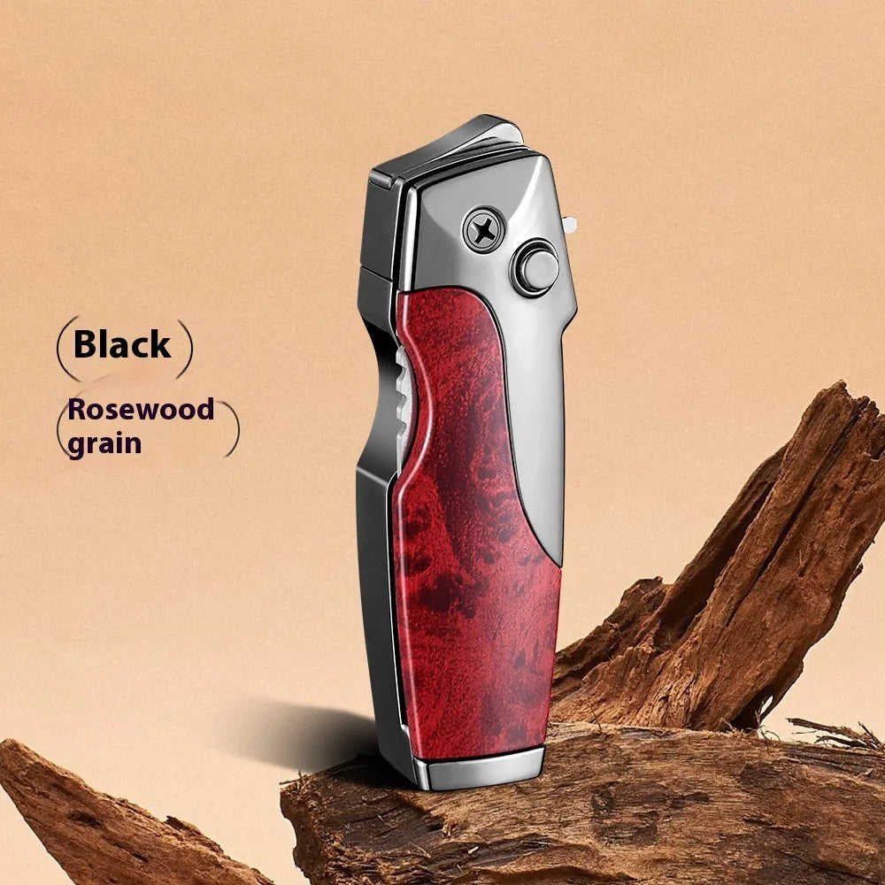 Zinc alloy metal folding lighter tool with integrated knife, shown in a carbon fibre finish.