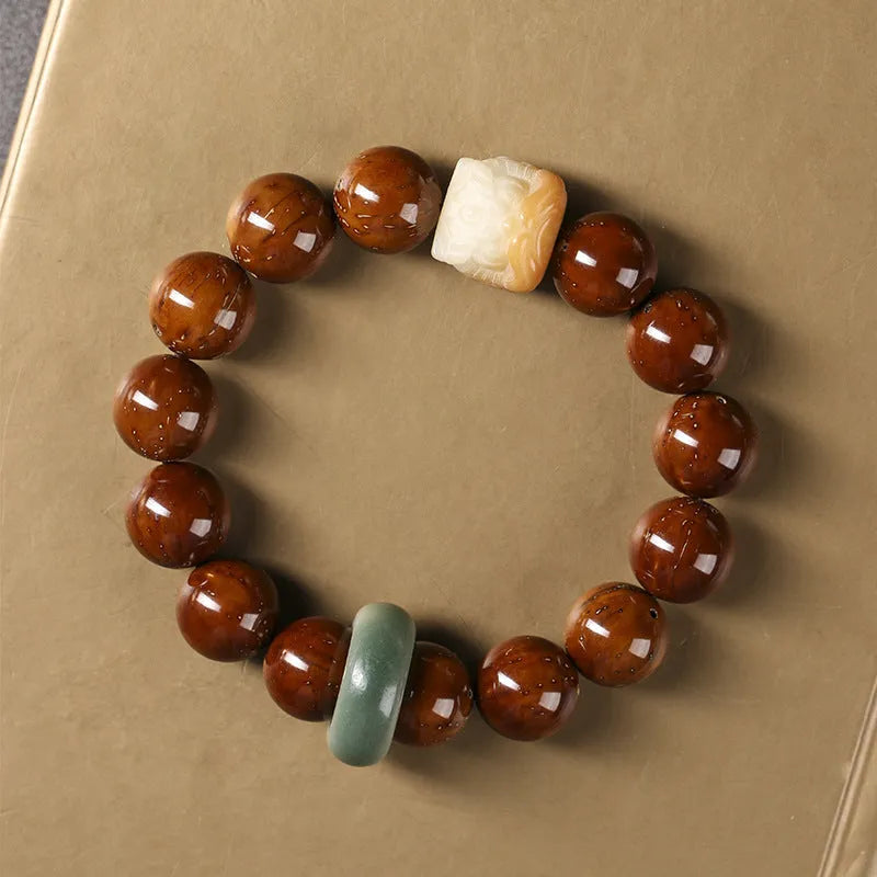 Hand-woven ivory nut lion round beads bracelet with 13mm beads and retro national style design