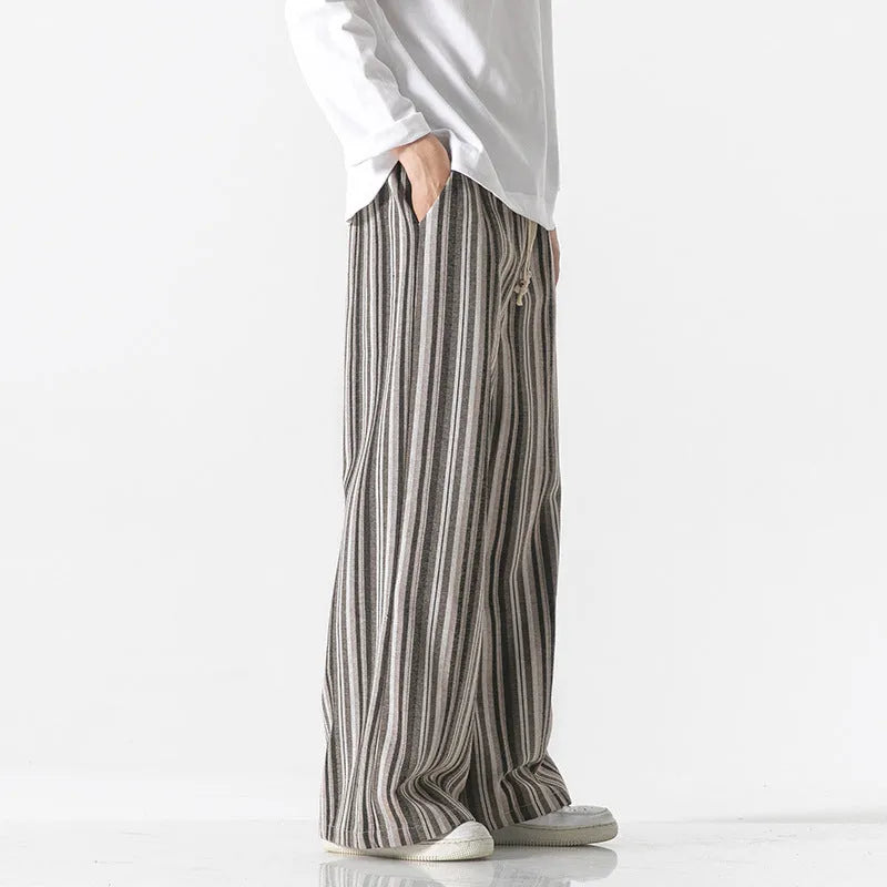 Vintage stripe loose straight mopping trousers in cotton blend fabric showing straight leg opening