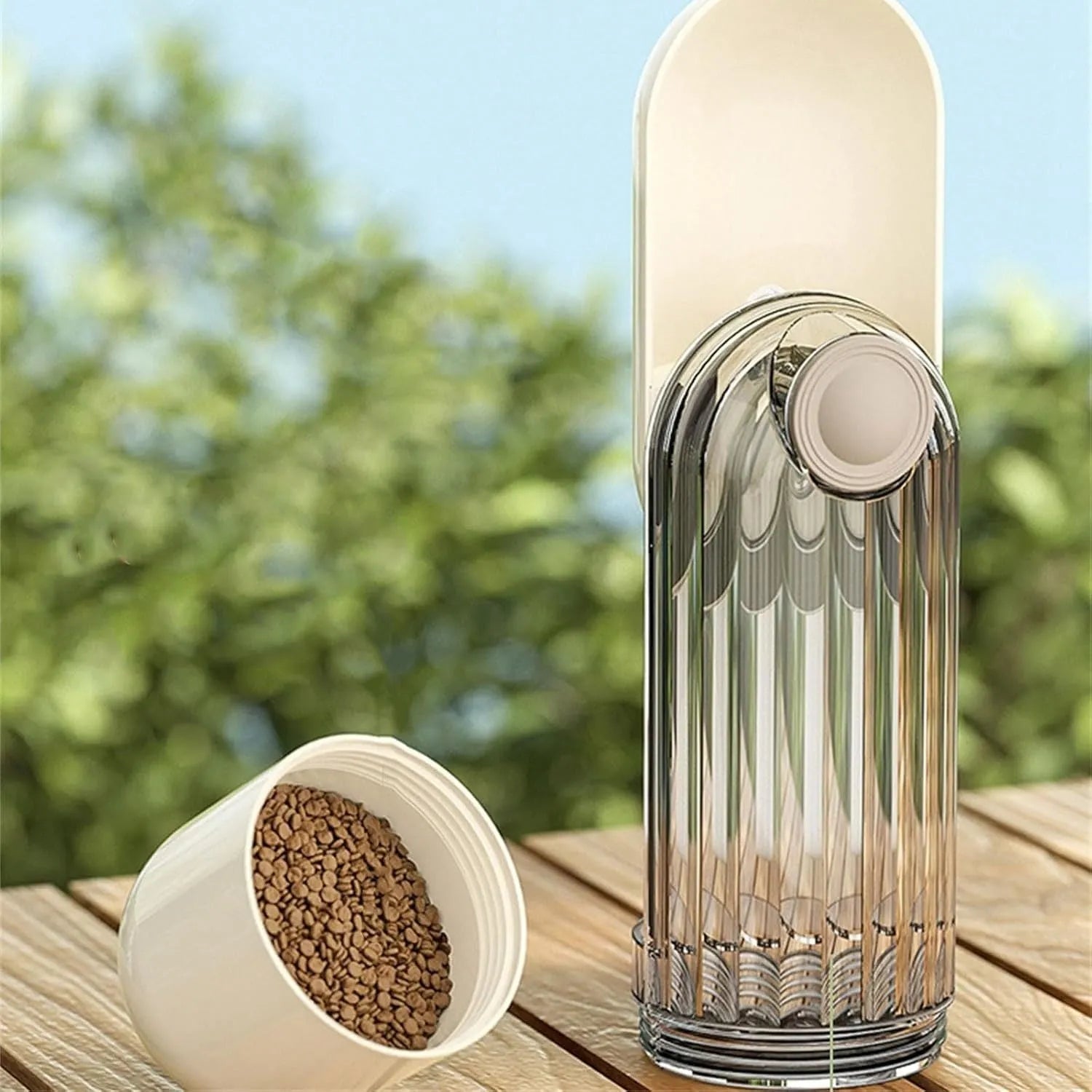 Foldable dog water bottle with food container in beige colour for walking and hiking with pets