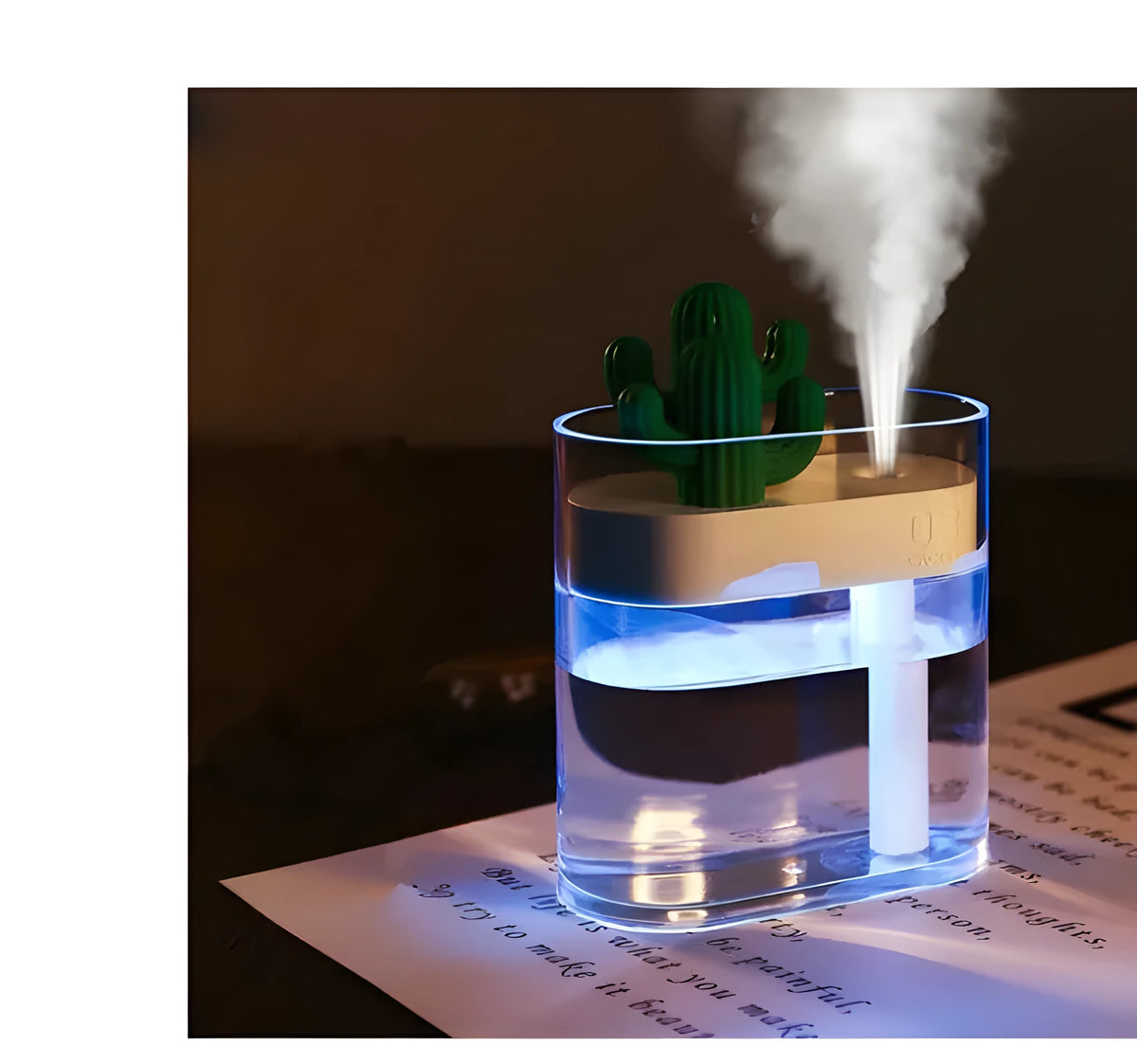 Transparent green cactus-shaped portable USB humidifier on a desk, 120mm tall