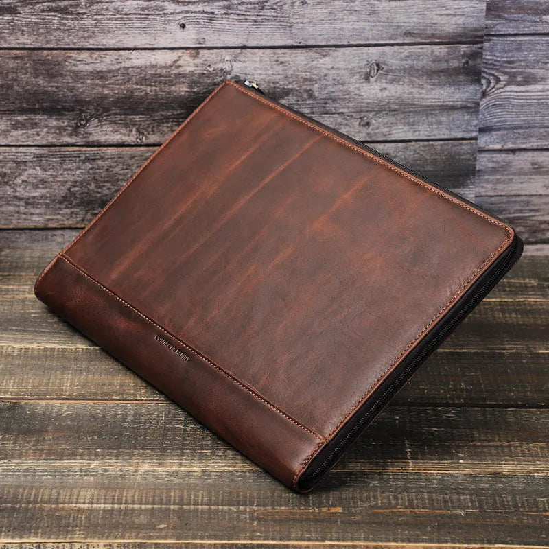 Crazy Horse oil leather laptop bag in coffee colour with zipper closure on white background