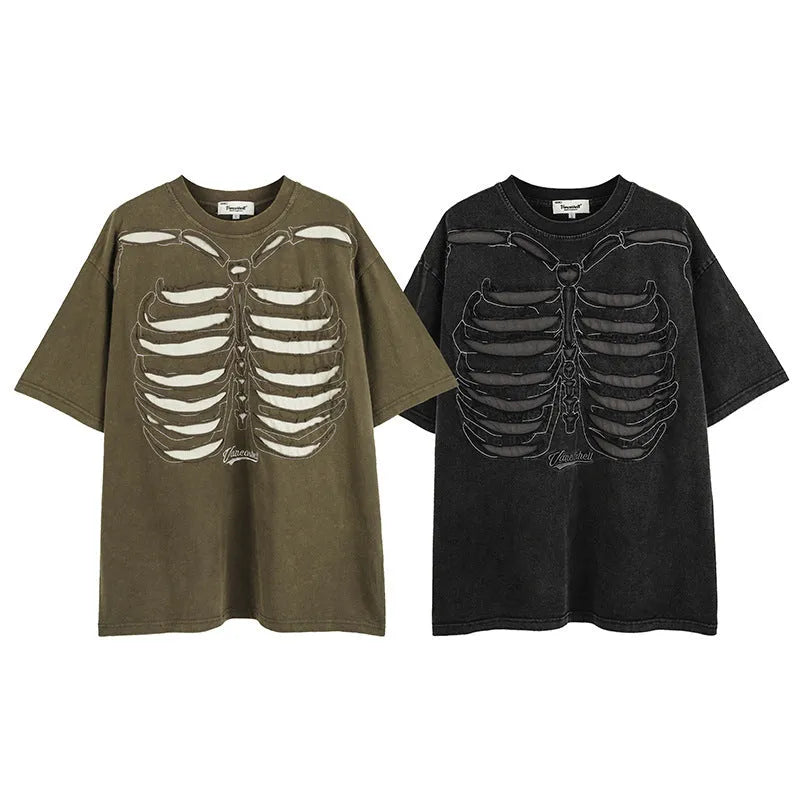 Man modelling a black loose-fit cotton short sleeve top with a skull and letters print.