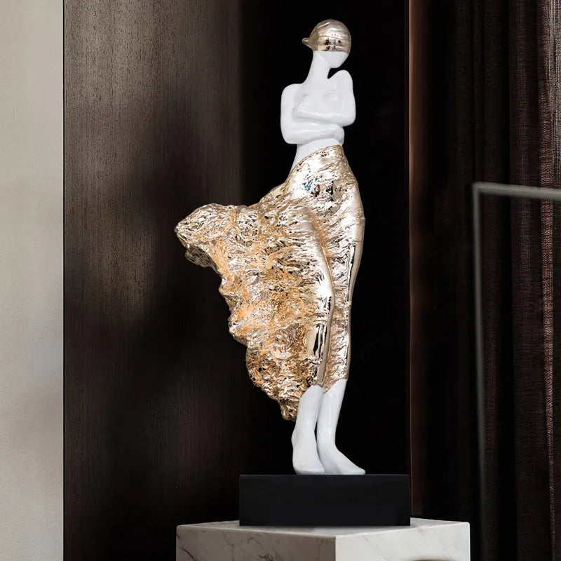 Modern sculptured resin ornament in rose gold or silver, 48cm high.