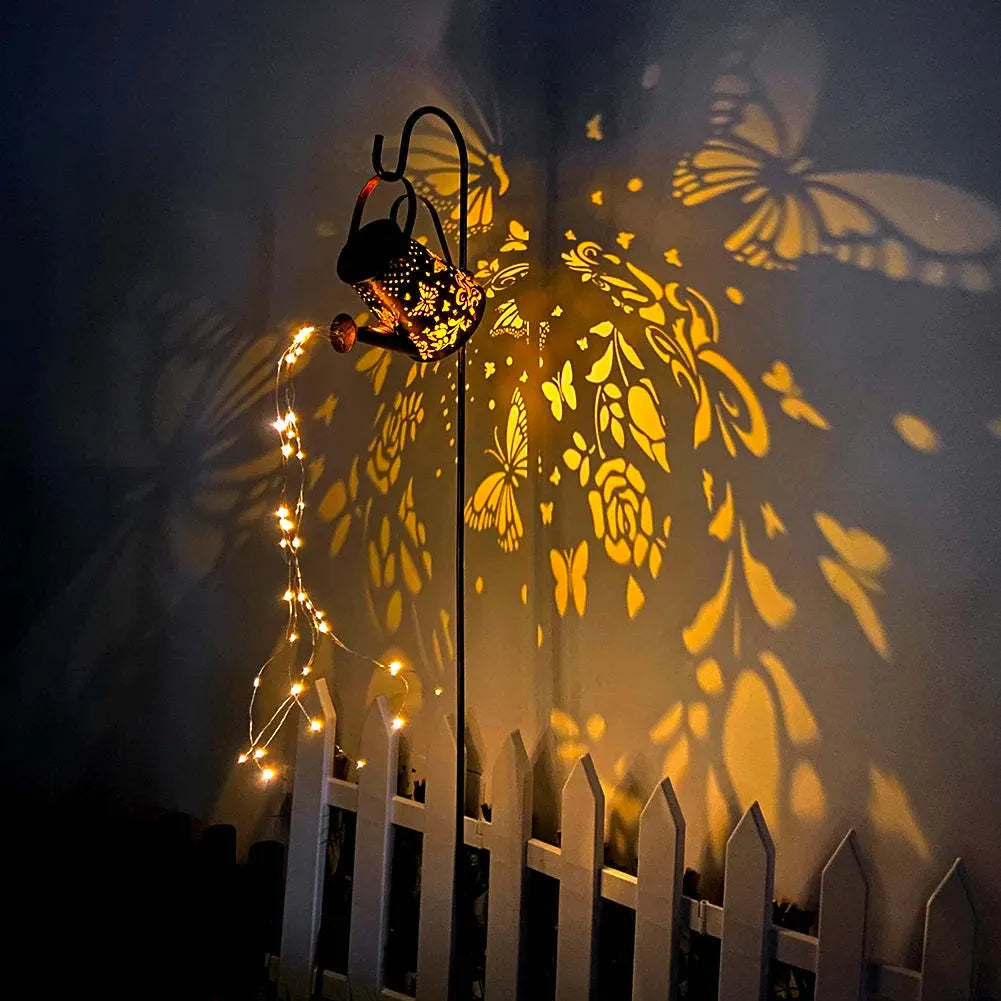 Solar garden lamp with tapered butterfly pattern iron frame and white LED light