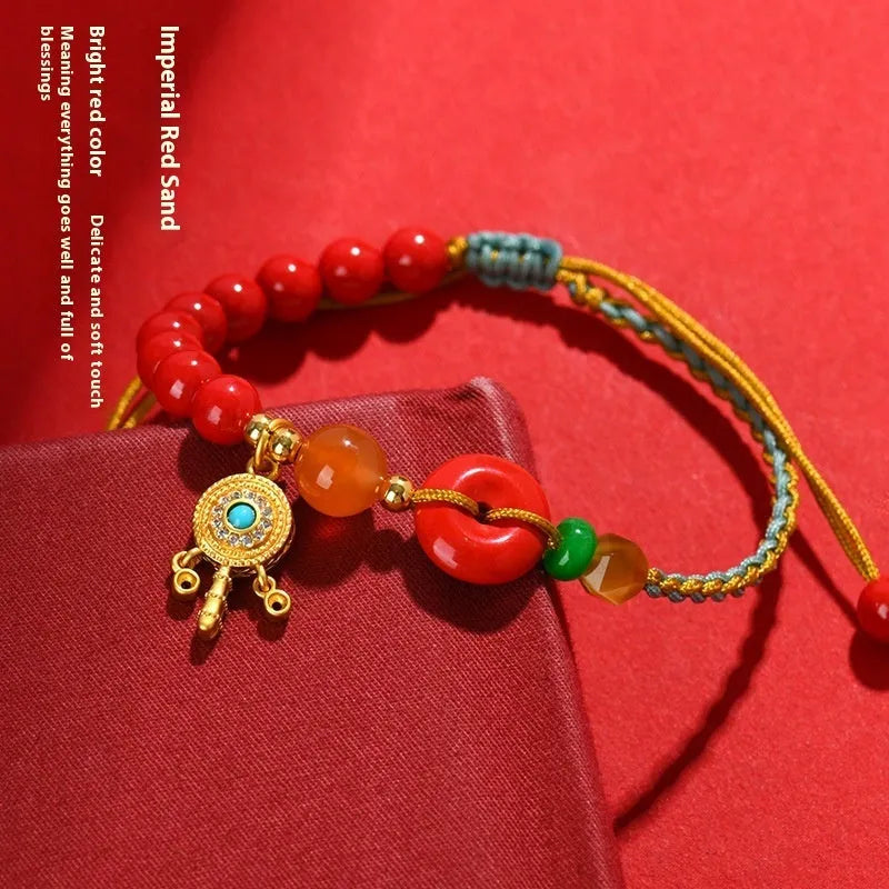 Hand-woven cinnabar peace buckle bracelet in emperor red sand colour with geometric pattern