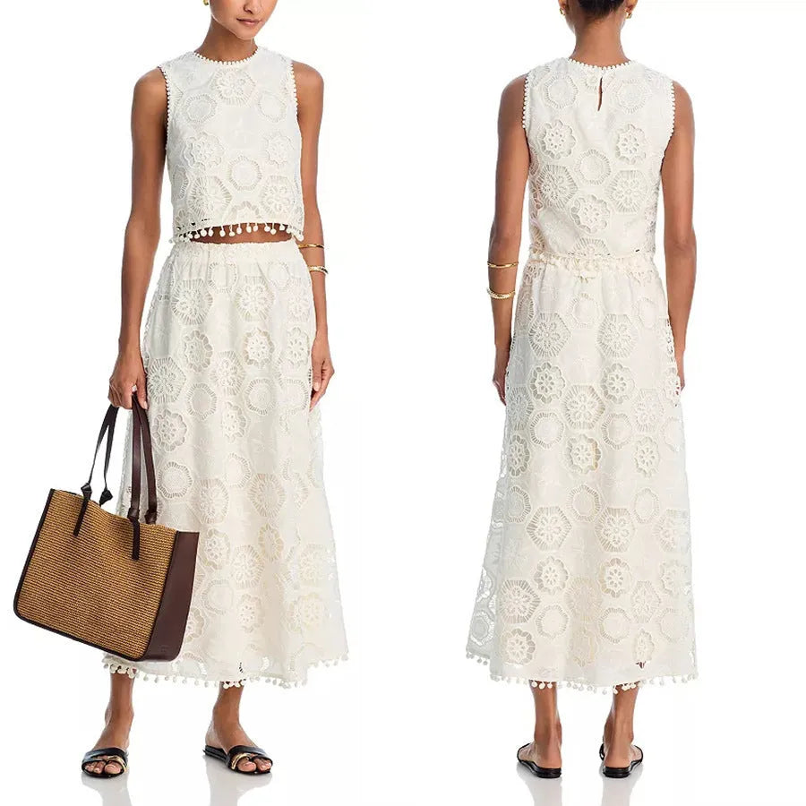 White women's two-piece suit with sleeveless top, long embroidered skirt, retro style.