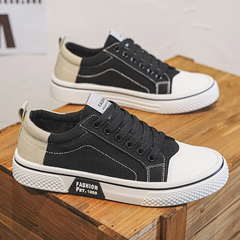Men's blue canvas casual skateboarding shoes with round toe and lace-up front