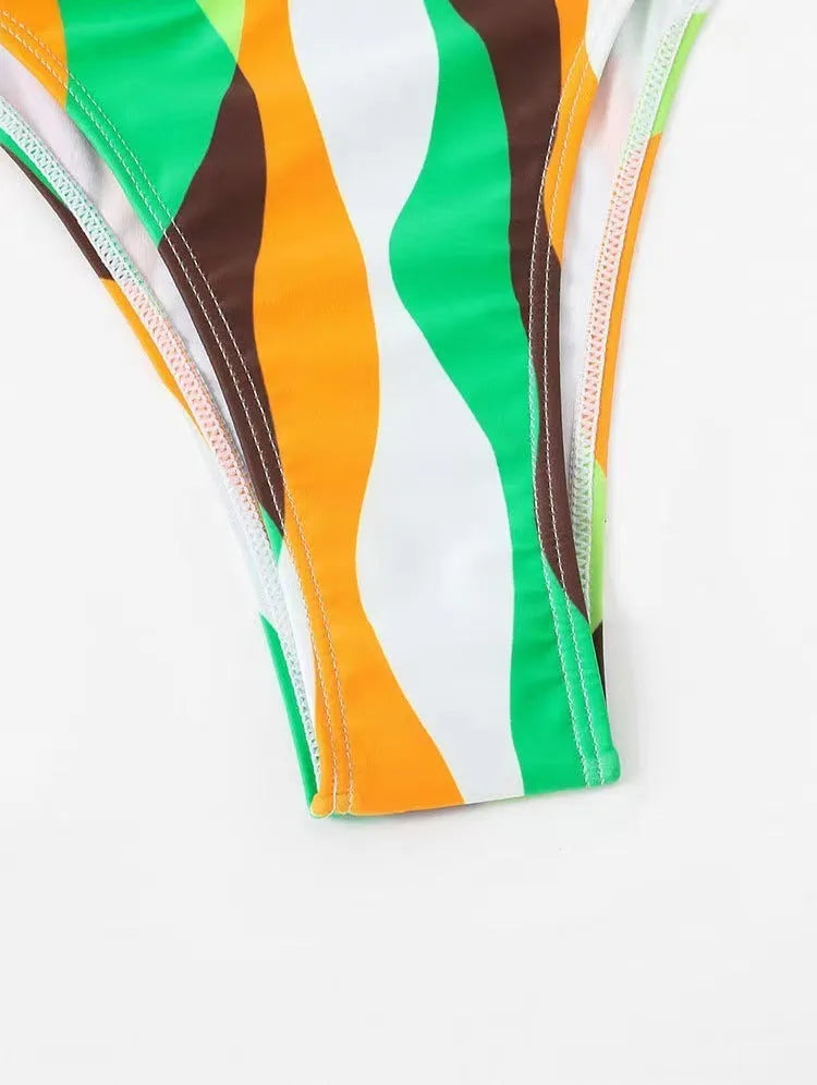Yellow green women's split swimsuit three-piece set with printed beach skirt.