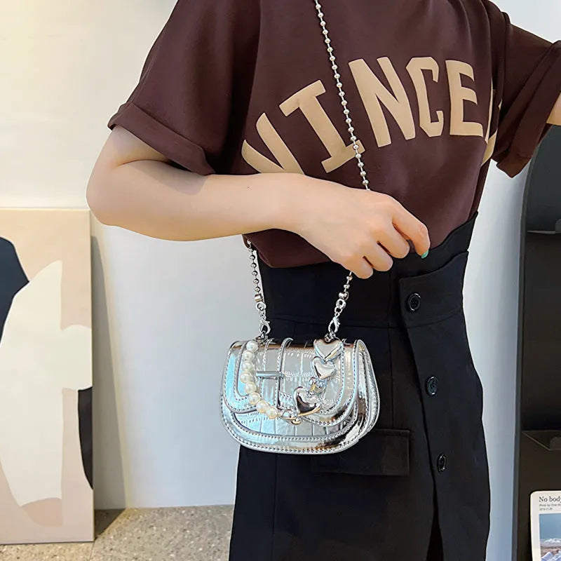 Women's mini PU crossbody tote bag in black, shown with single strap, phone pocket, and sandwich pocket.