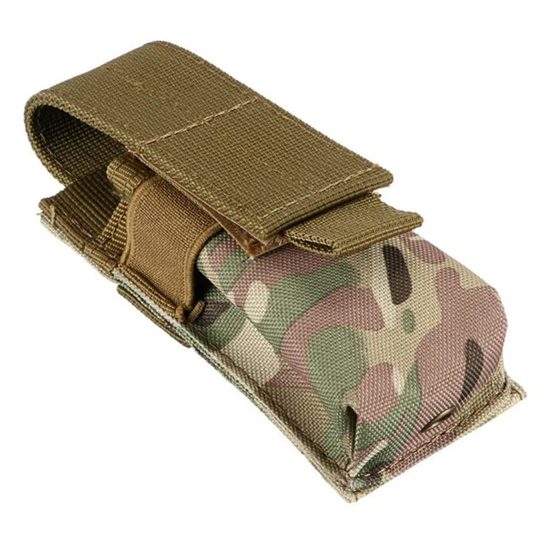Black tactical MOLLE pouch with elastic cord closure for pistol cartridges or a small flashlight.