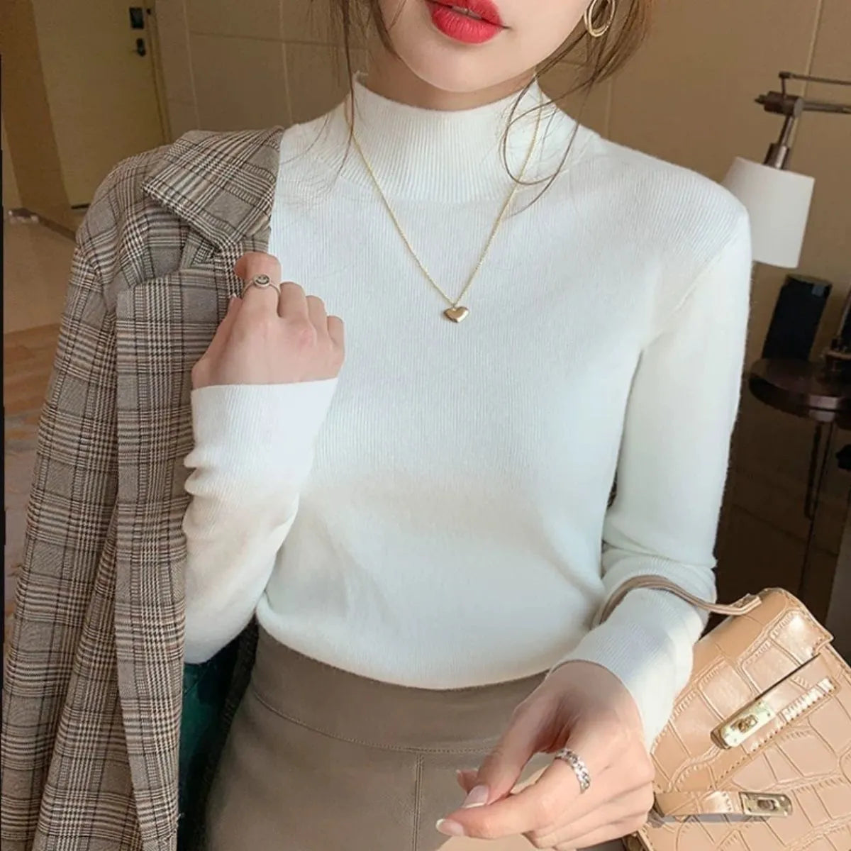 Women's slim fit viscose knitted top in apricot colour with long sleeves
