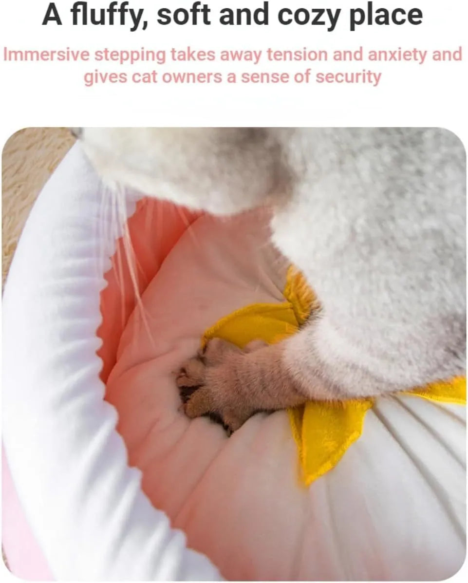Pink honey pot shaped cat bed with a removable circular cushion inside for a small pet.