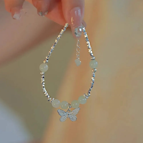 Silver butterfly necklace and bracelet set for women with electroplated copper construction