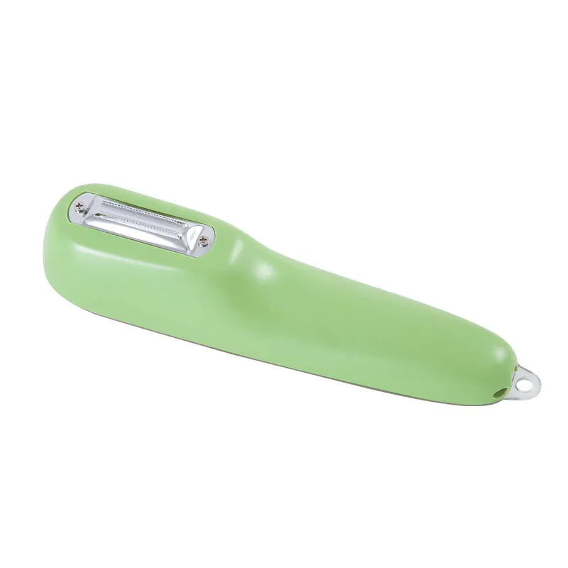 Dark green kitchen peeler with storage tube showing stainless steel blade and hanging hole on handle