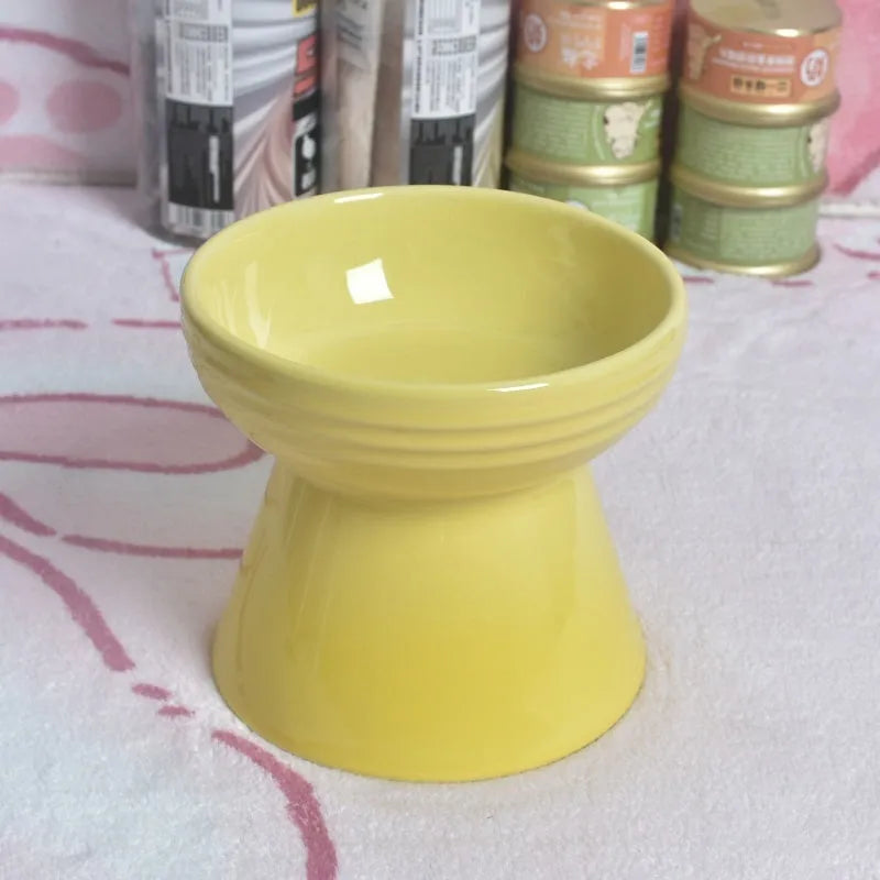 Black ceramic pet bowl with a high foot and neck protector to prevent tipping, shown with flat and slanted rim options.