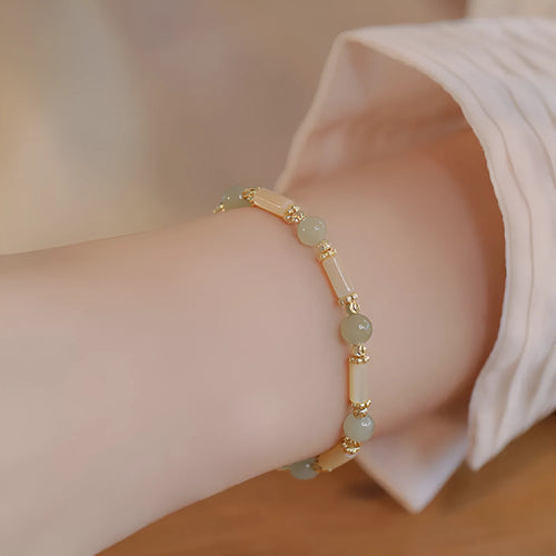 Hetian jade women's bracelet with bamboo joint design and 6mm beads.