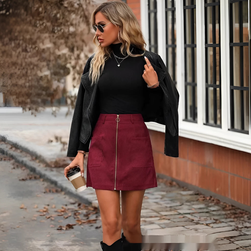 Women's high-waist short skirt with front zipper in black, camel, brick red and dark green colours