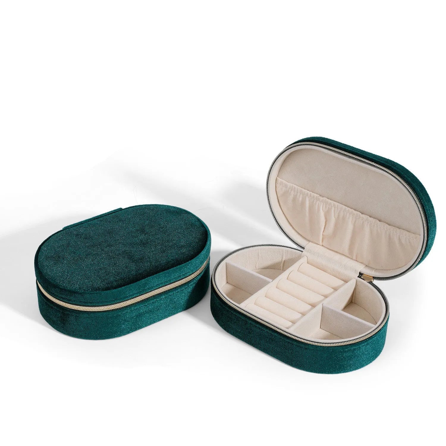 Oval velvet jewellery storage box in multiple colours with flannel lining, showing compact 15x10x5 cm size.