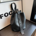 Soft PU retro niche bucket bag in beige, square vertical shape, double shoulder straps, 33x29x20cm