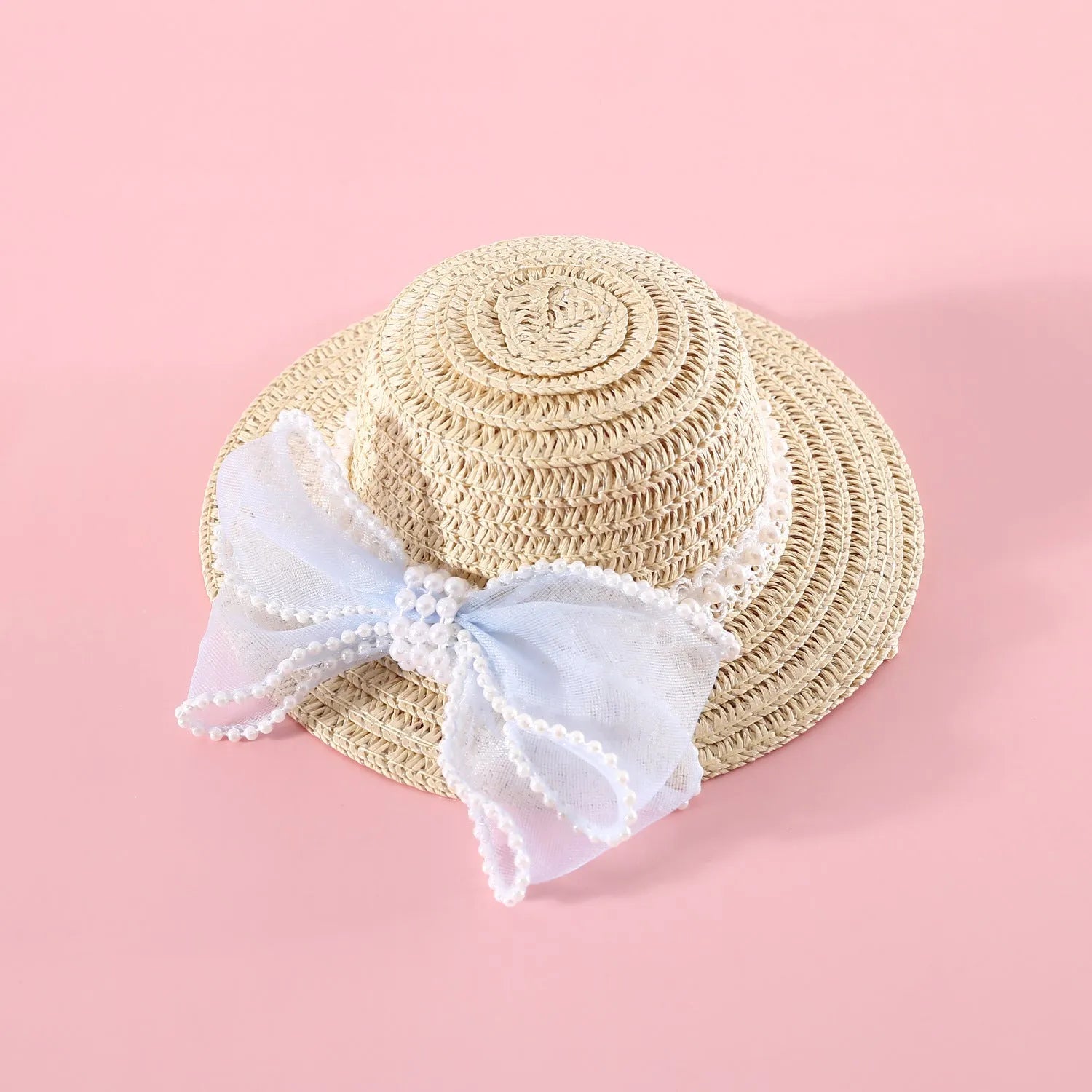 Woven straw cat hat with a pearl bow, shown in blue, pink, purple, and white colour options