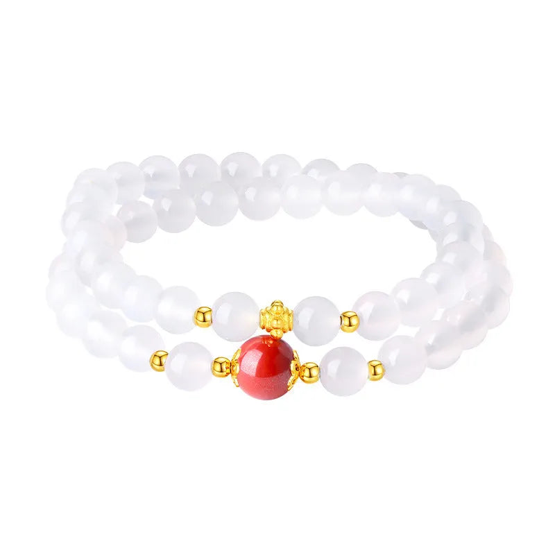 Women's white agate bracelet with cinnabar accents featuring 6mm geometry beads in double layer design