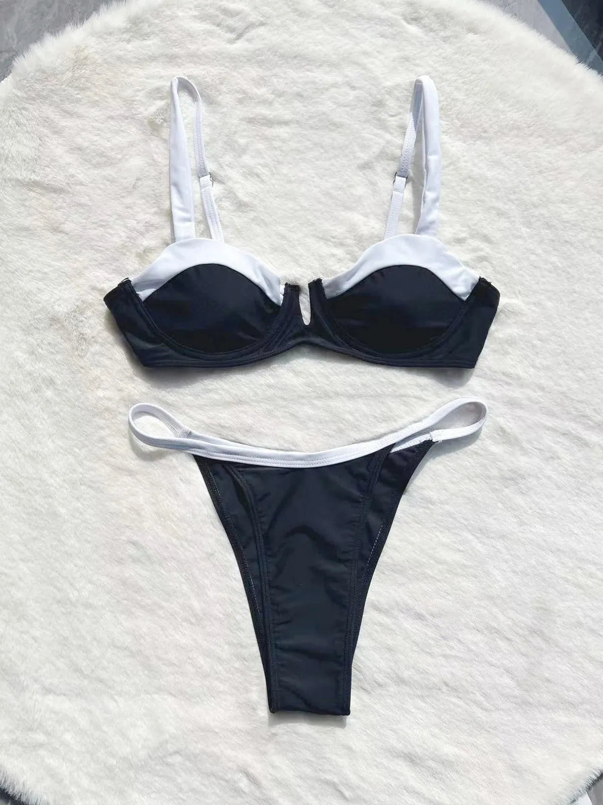 Black low waist women's bikini with stitching split design and brief style