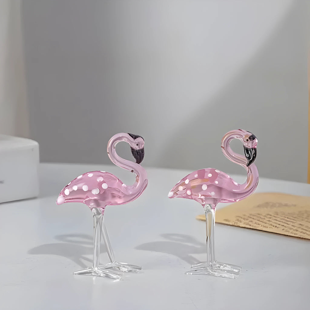 Pink and white crystal flamingo decorative ornament on a table, showing modern simple style.