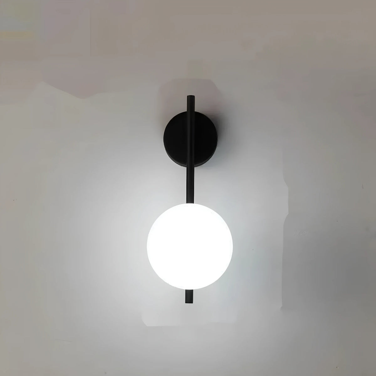 Nordic wrought iron wall lamp in black with milky white glass shade, 12x30cm, warm light